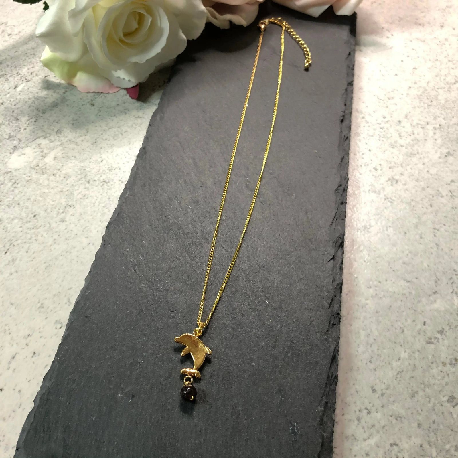 Miniature Dolphin & Garnet Bead Gold Plated Natural Leaf Pendant