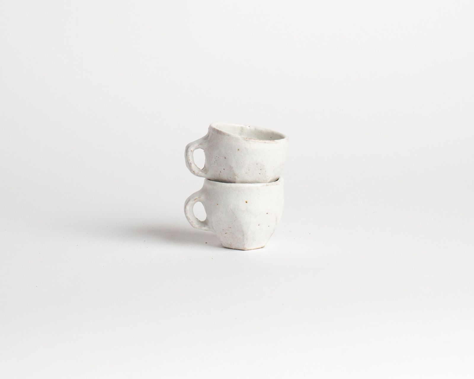 STONEWARE DOUBLE ESPRESSO CUP IN FACETED WHITE