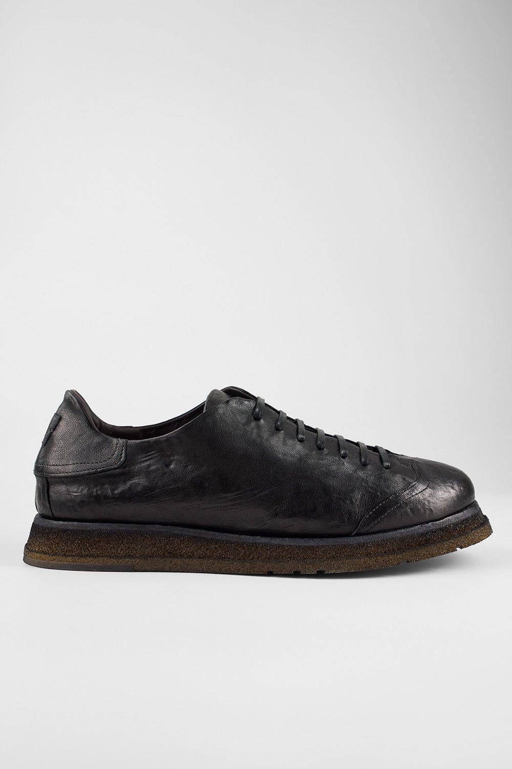 AJAX black distressed lightweight hybrid sneakers.