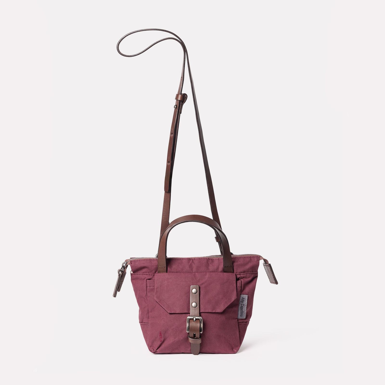 Squat 2.0 Waxed Cotton Mini Crossbody Bag in Grape