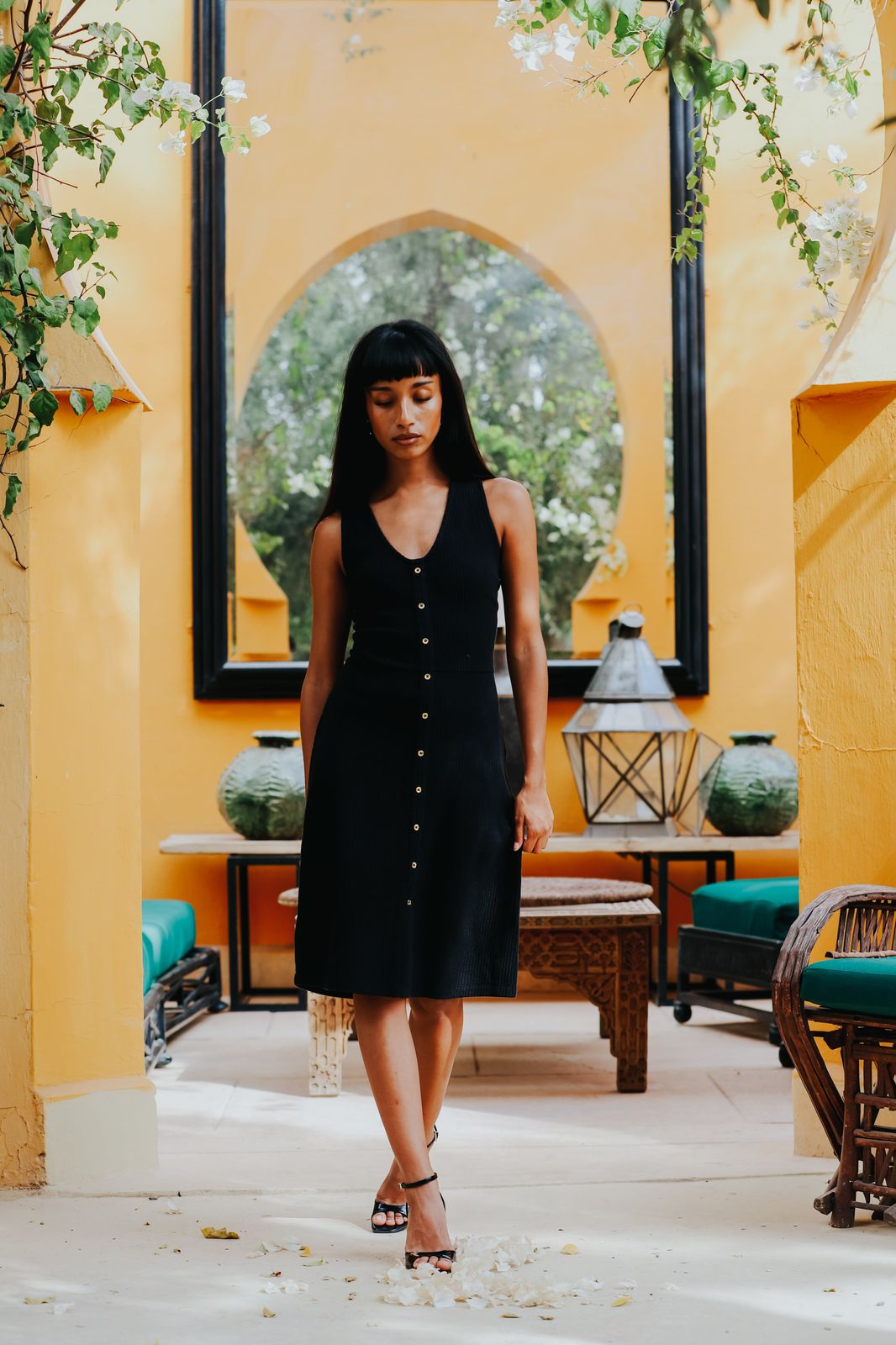 The Kōr Organic Cotton Ribbed Pinafore Dress in Black