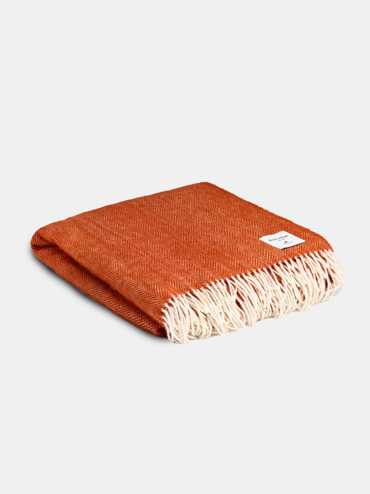 The Selsey Herringbone Throw - Desert Sky