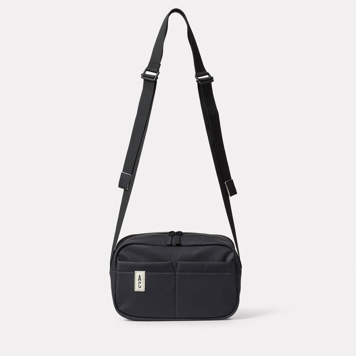 Hinge Abaca Crossbody Bag in Black