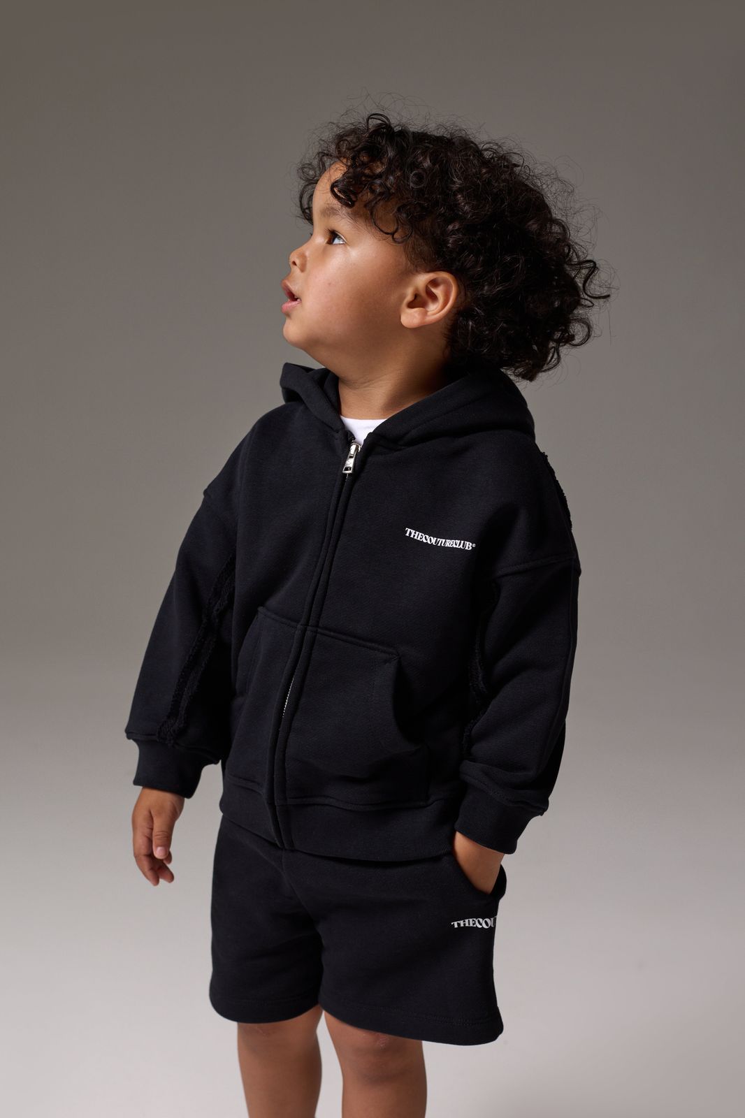 KIDS COPYRIGHT ZIP THROUGH HOODIE - BLACK